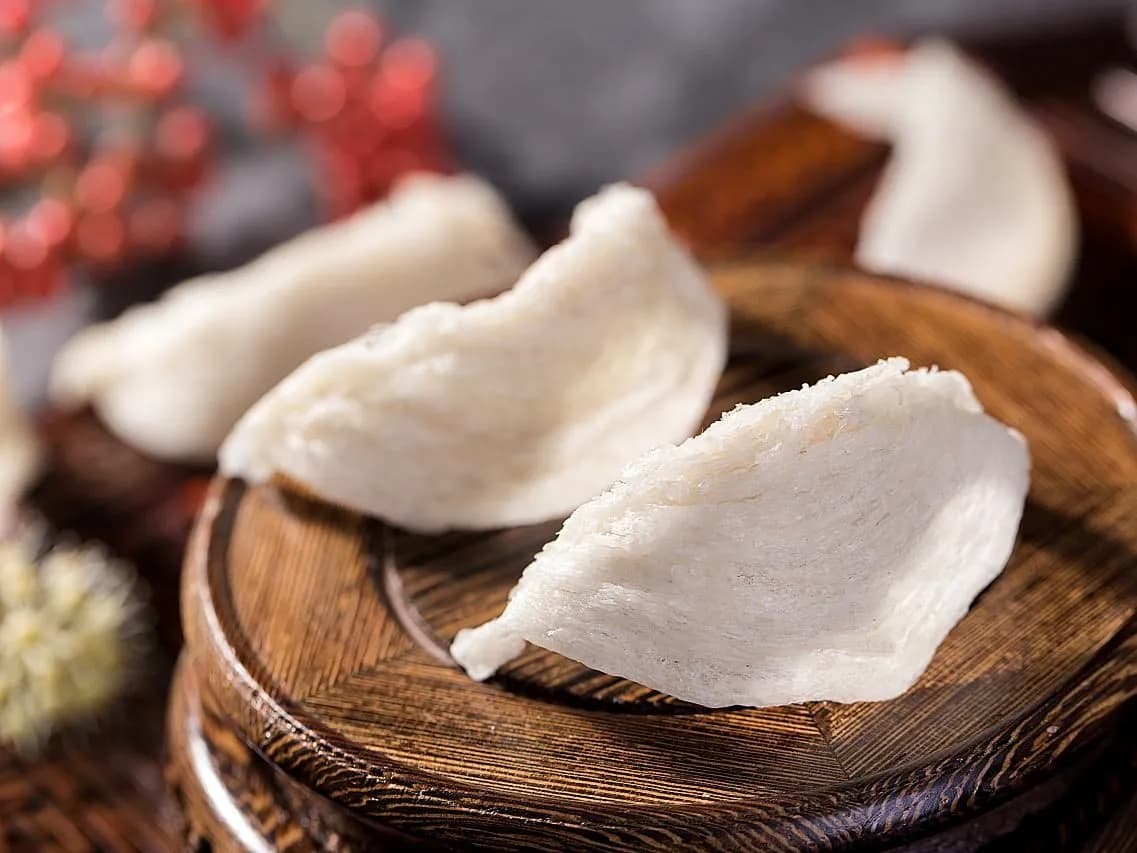 Cleaned edible bird's nests on a wooden stand